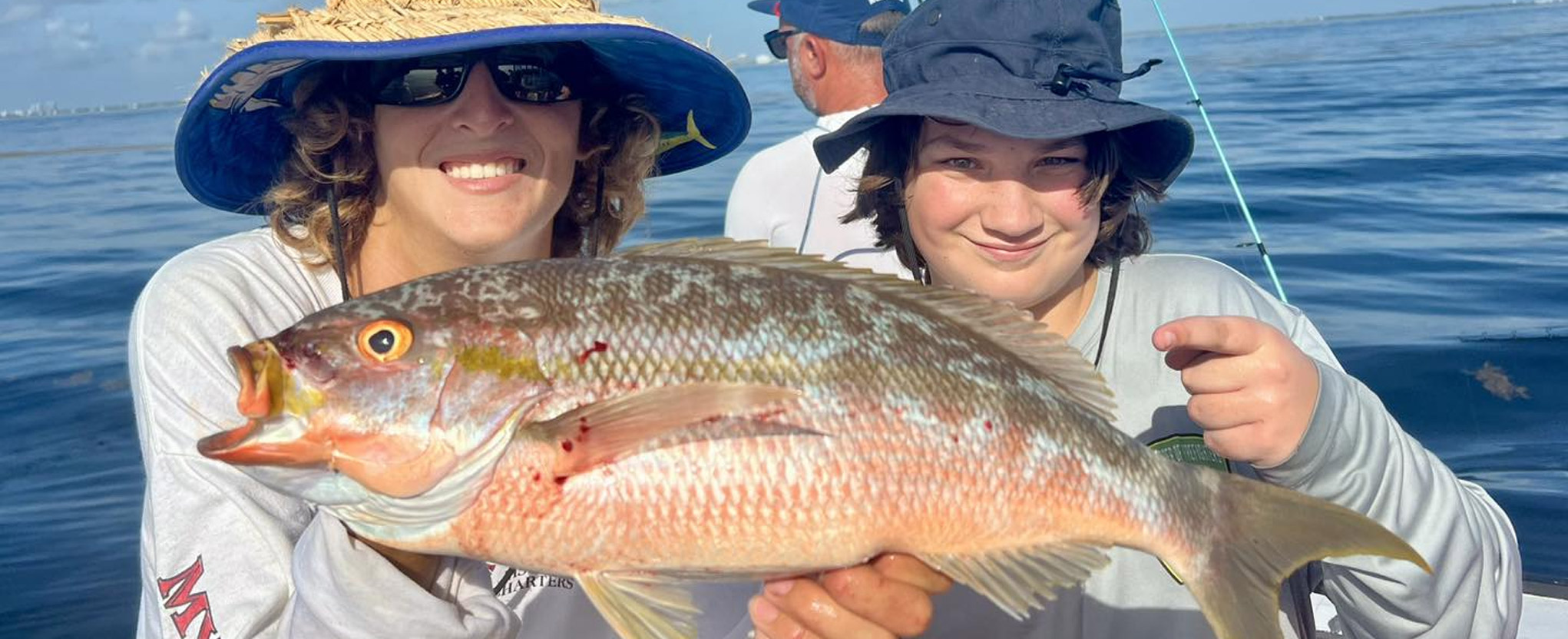 Jupiter Charter Fishing captains on desktop